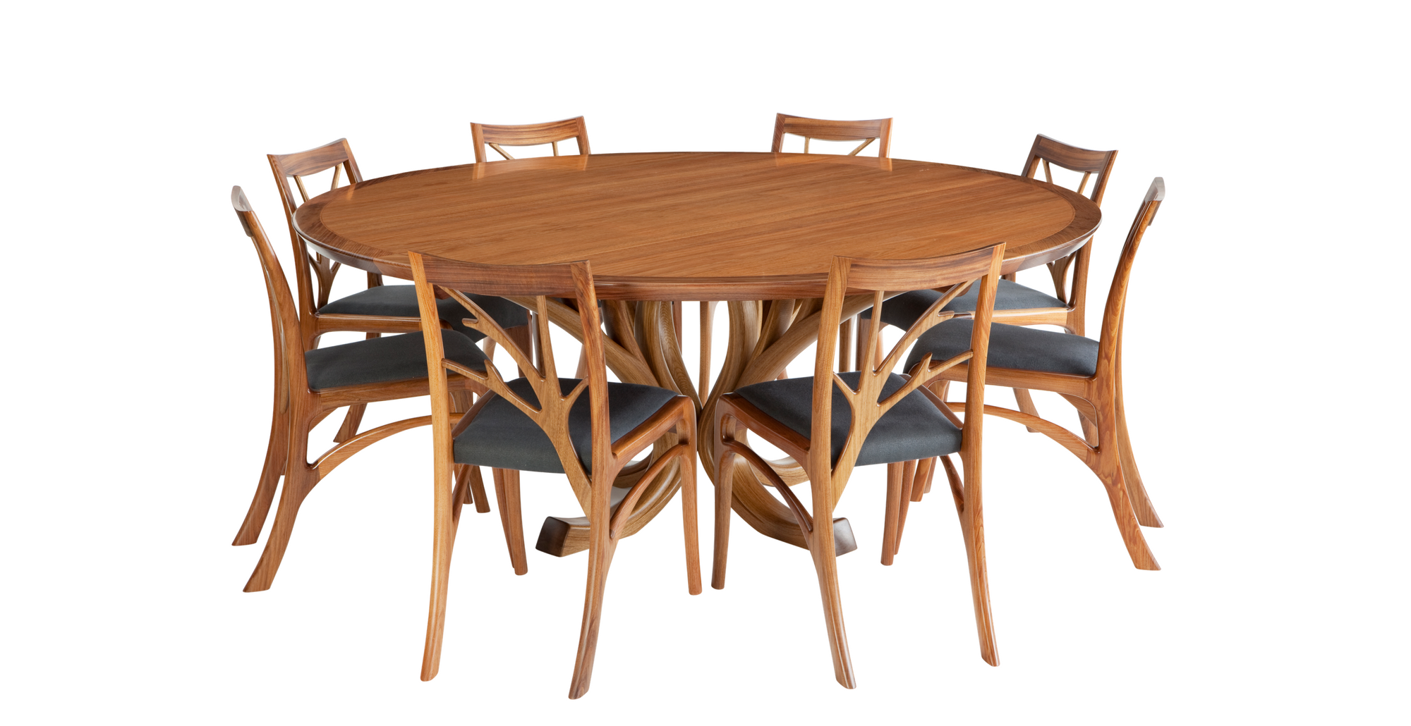 Custom made solid timber round dining suite by Will Marx of Marxraft